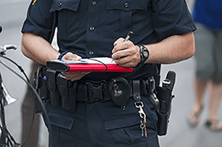 Police office writing a ticket